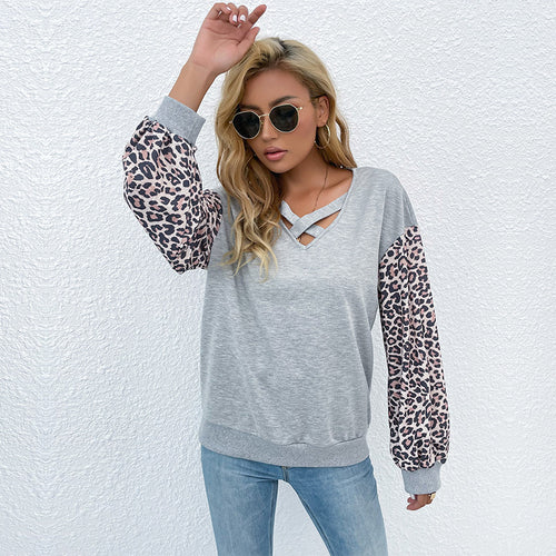 Damen modischer Pullover mit trendigen Animal-Print-Ärmeln und raffiniertem V-Ausschnitt Drune