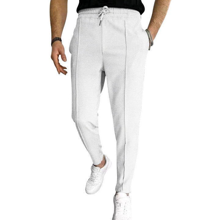 Herren nan schmal zulaufende Jogging-Chino aus strukturierter Webqualität mit elastischem Tunnelzugbund und dekorativer Bügelfalte Drune