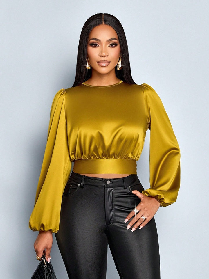 Damen Elegant geschnittene Leoparden-Bluse mit Dekolleté und Schleifenrand Drune