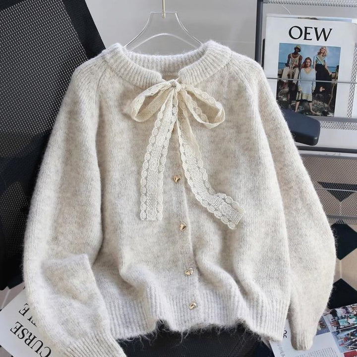 Damen kuschelige Strickjacke mit Herzknopf-Details und Schleifenakzent Drune
