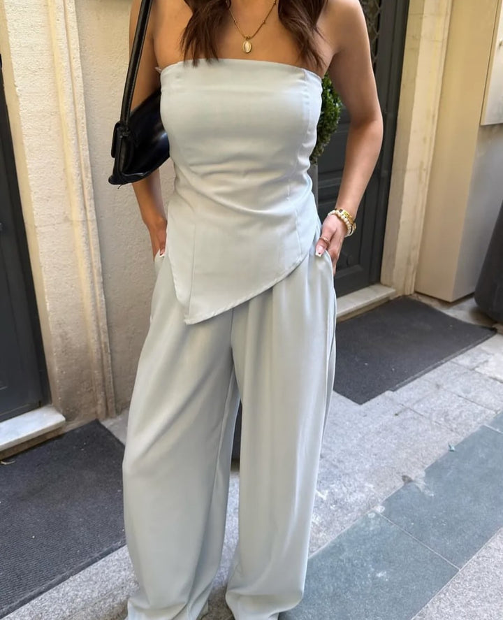 Damen eleganter Jumpsuit mit Schulterfreier Schnittführung und fließendem Material Drune