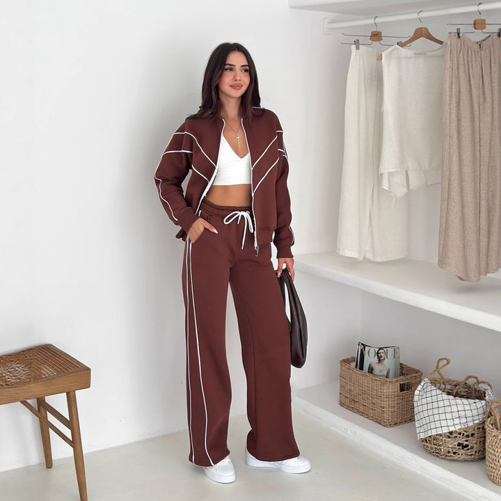 Damen Sportanzug mit stylischen Kontrastelementen und hohem Kragen Drune
