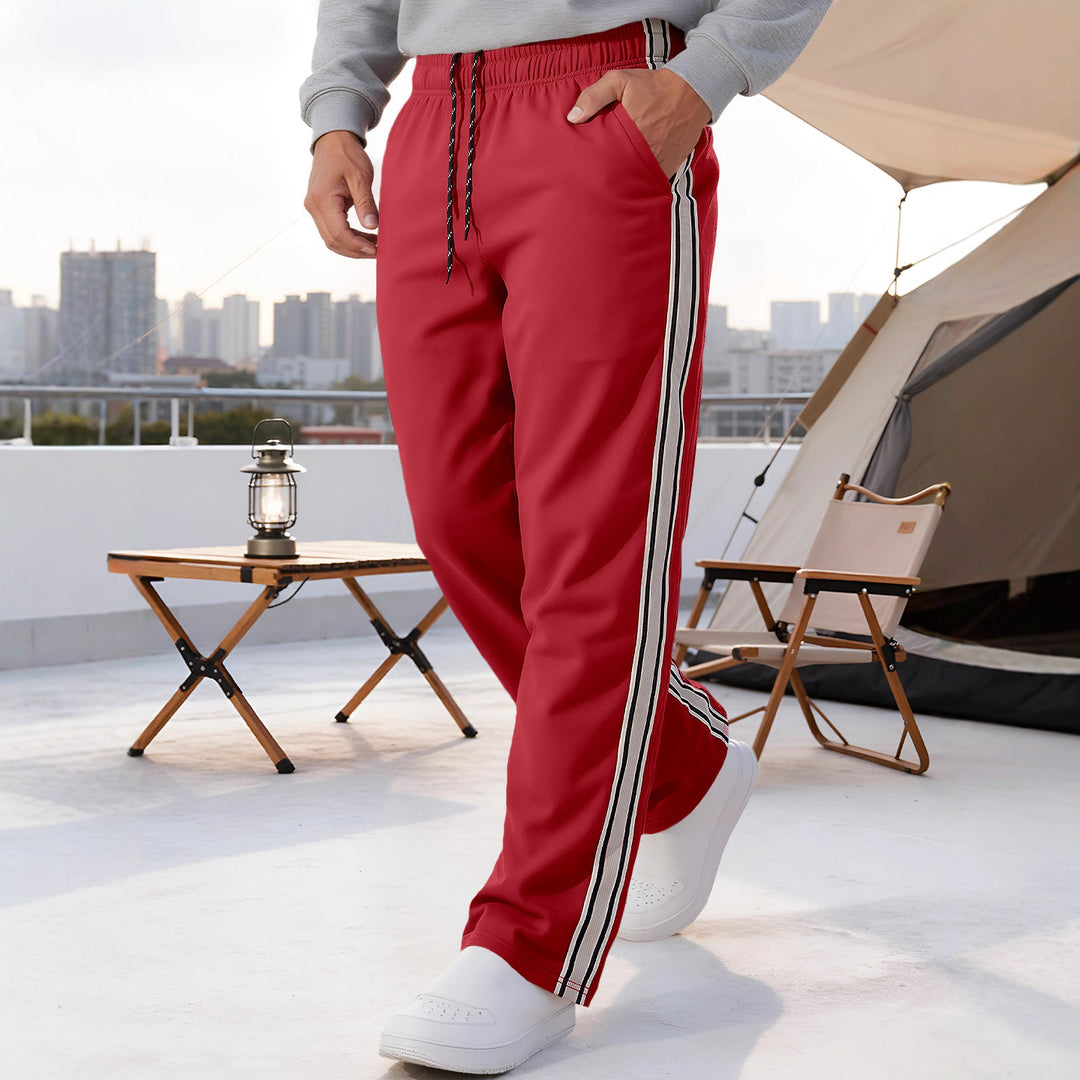 Herren nan Retro-Trackhose mit schmal zulaufendem Bein elastischem Bund Tunnelzug und seitlichen Streifen Drune