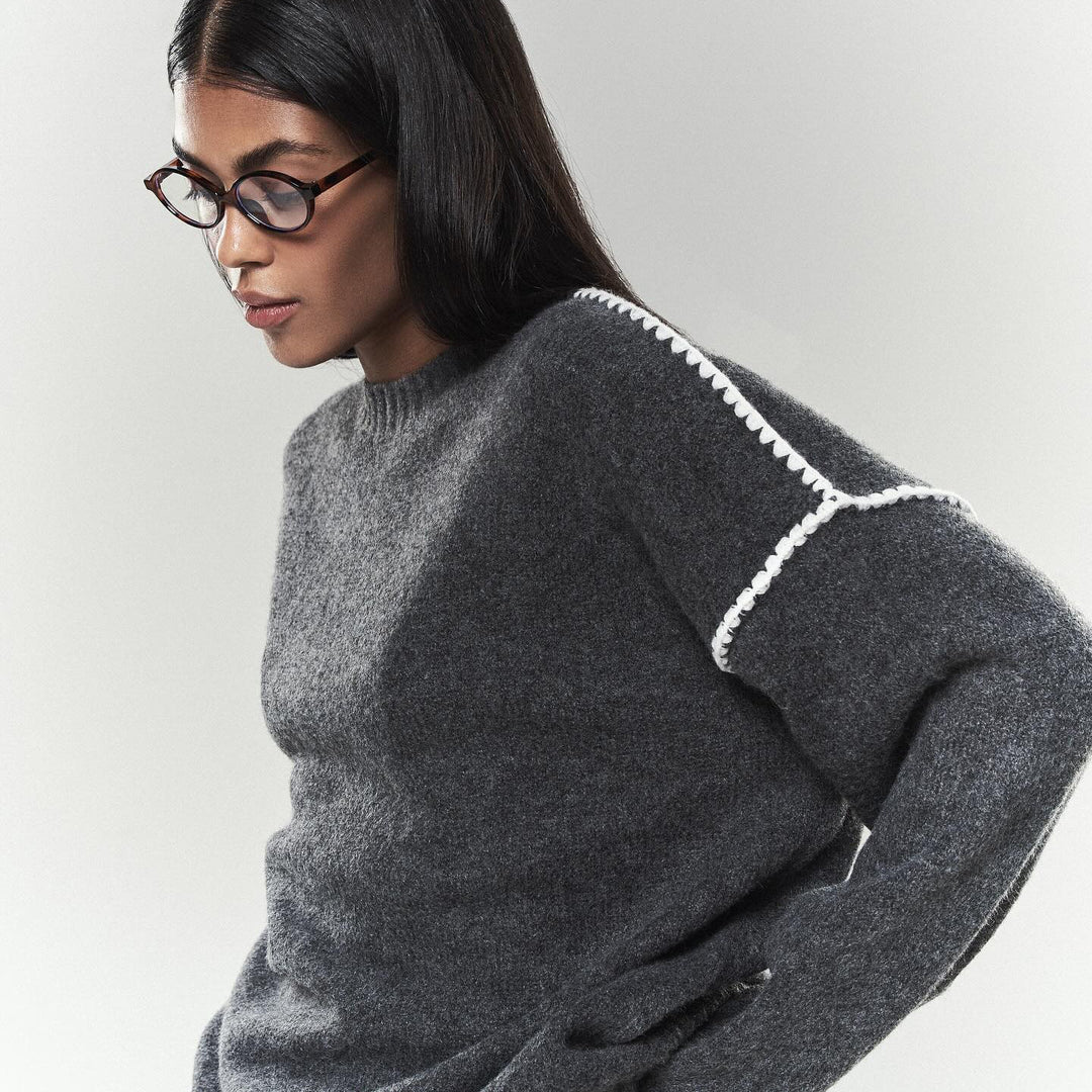 Damen eleganter Strickpullover mit einzigartigen Rippstrukturen und modischen Akzenten Drune