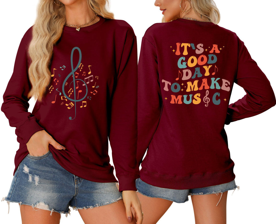 Damen Sweatshirt mit musikalischem Motiv und kreativem Schriftzug Drune