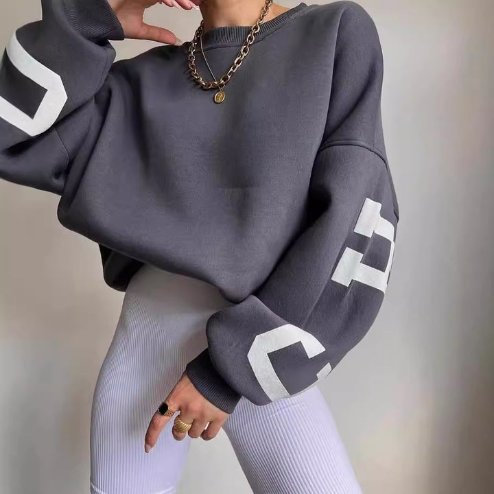 Damen lässiger Oversized Sweater mit kontrastierenden Ärmeln Drune