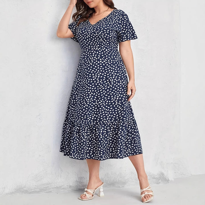 Damen Midi-Kleid mit fließendem Schnitt und verspieltem Muster Drune