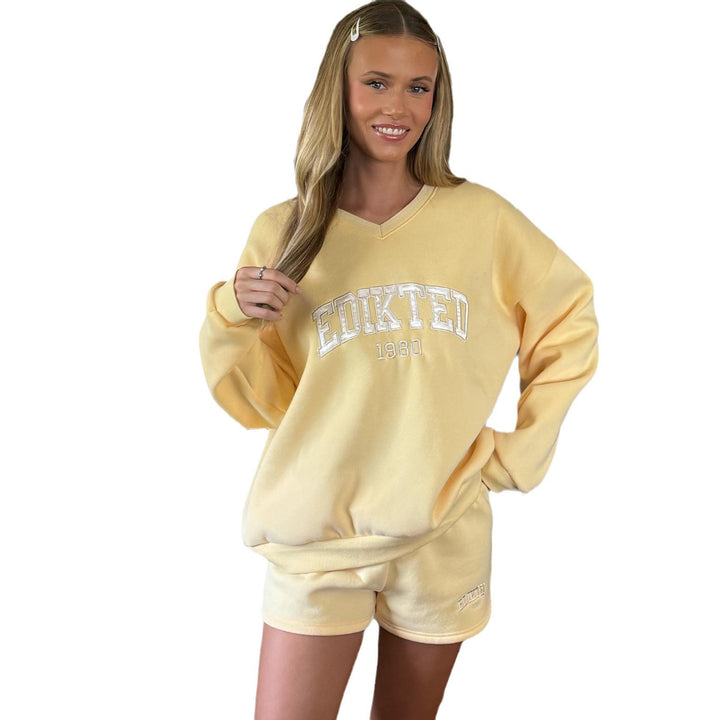 Damen casual Sweatshirt mit V-Ausschnitt und modernem Schriftzug Drune