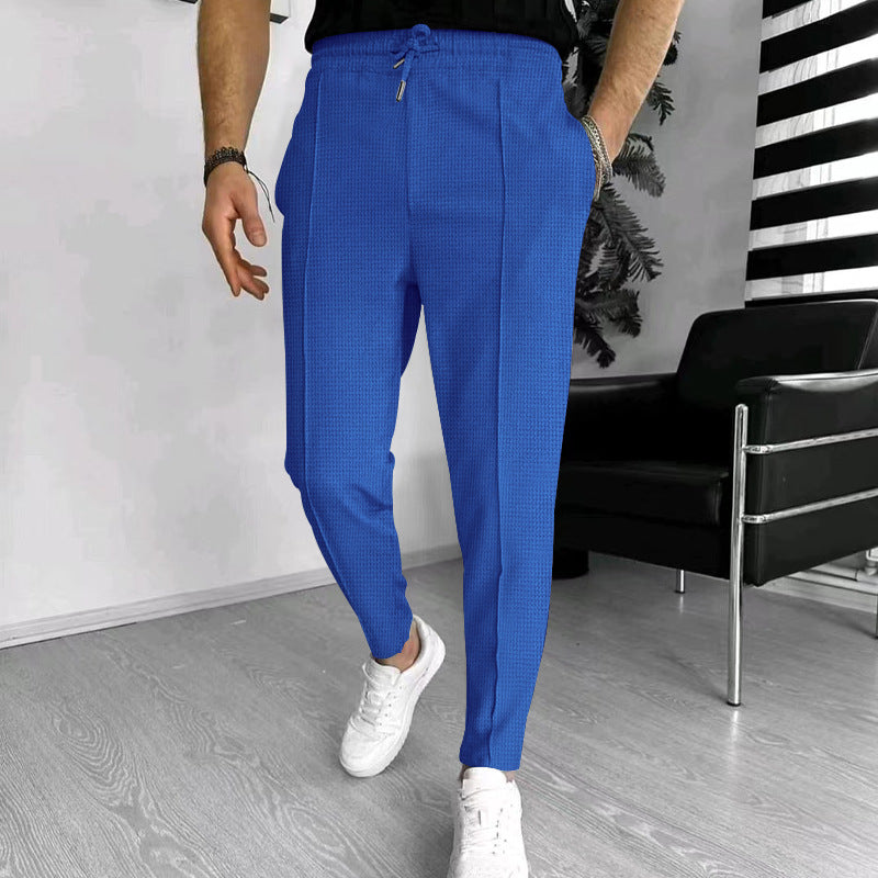 Herren nan schmal zulaufende Jogging-Chino aus strukturierter Webqualität mit elastischem Tunnelzugbund und dekorativer Bügelfalte Drune