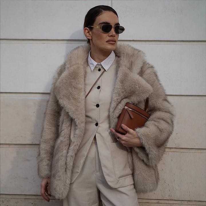 Damen Kunstfelljacke mit voluminösen Ärmeln und luxuriösem Design Drune
