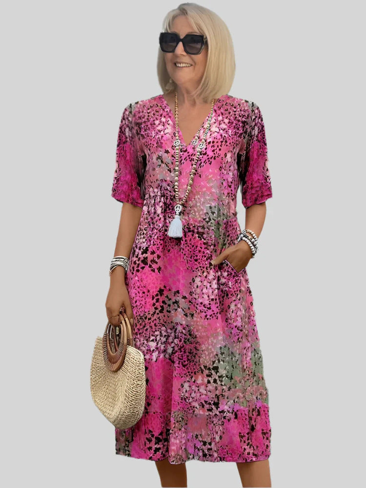 Damen Blumenmuster Midi Kleid mit Taschen Drune