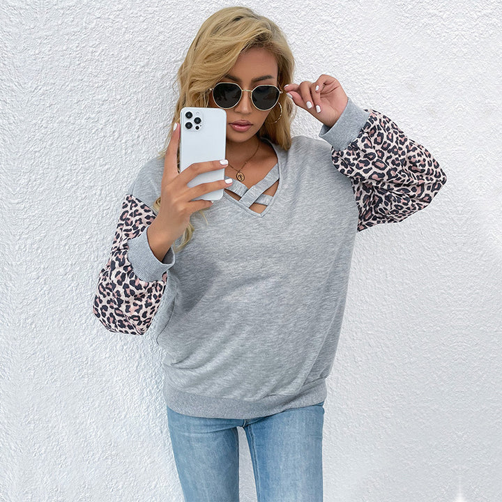 Damen modischer Pullover mit trendigen Animal-Print-Ärmeln und raffiniertem V-Ausschnitt Drune