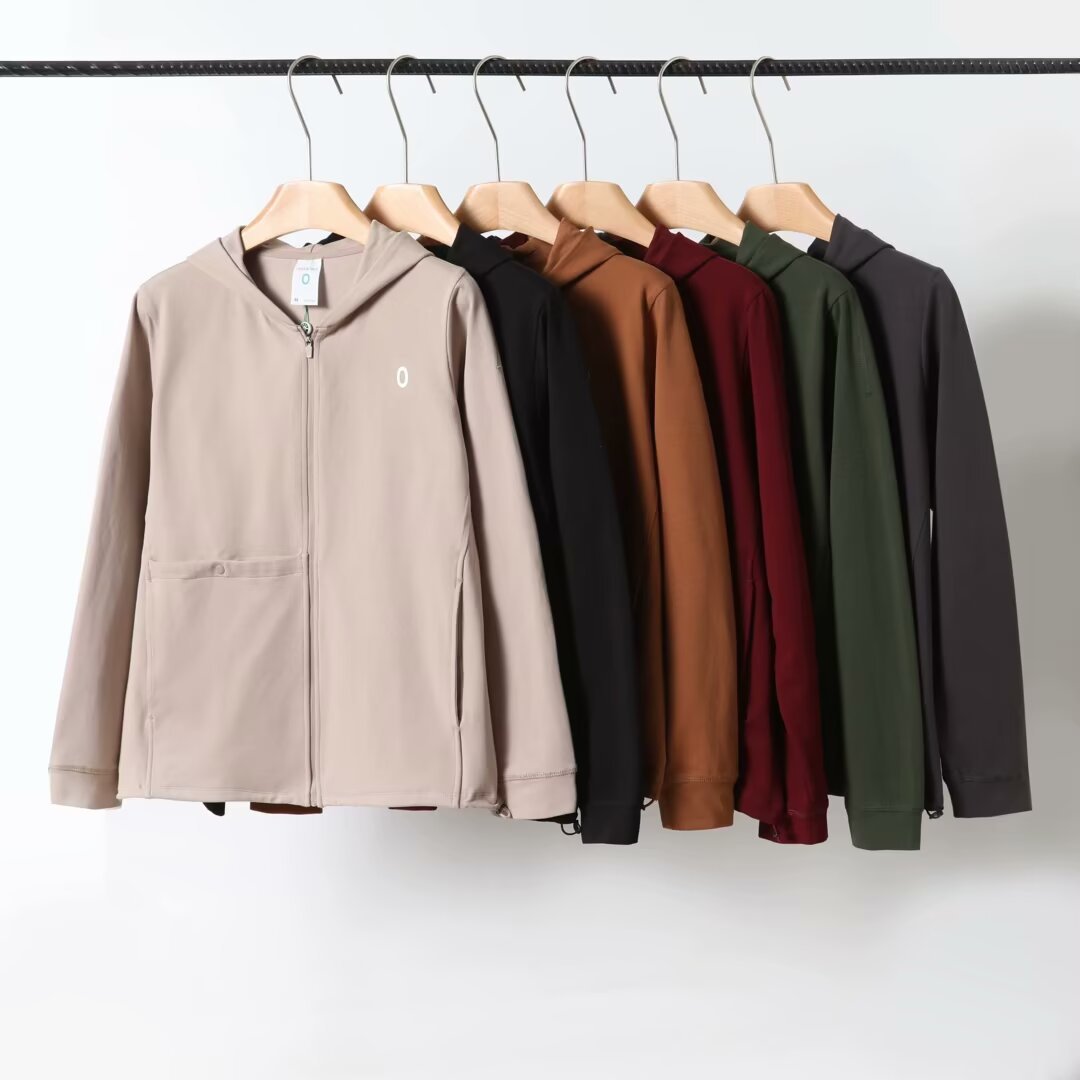 Damen atmungsaktive Kapuzenjacke mit innovativer Reißverschlusstasche Drune