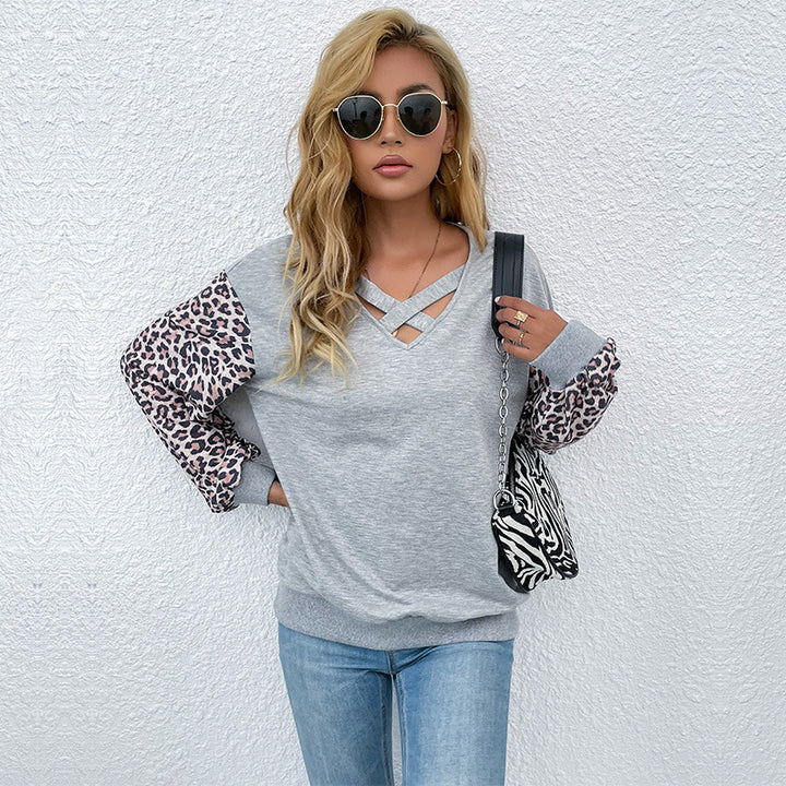 Damen modischer Pullover mit trendigen Animal-Print-Ärmeln und raffiniertem V-Ausschnitt Drune