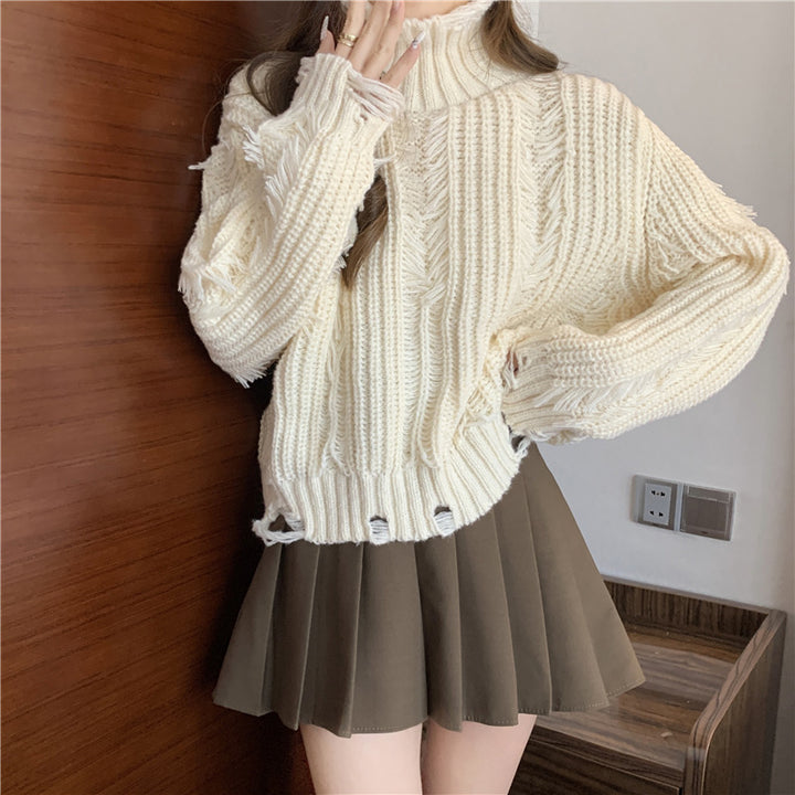Damen Grobstrickpullover mit hohem Kragen und fransigen Designelementen Drune