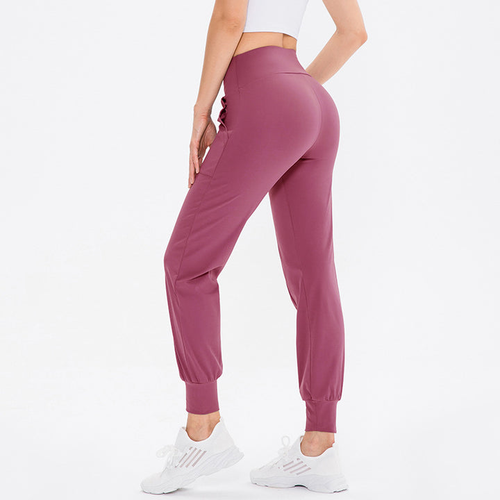Damen elastische Sporthose mit praktischen Seitentaschen und temperaturregulierendem Material Drune