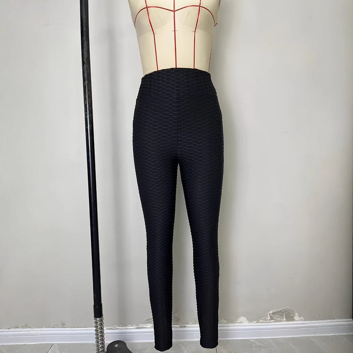 Drune | Hochtaillierte Sportleggings mit strukturierter Oberfläche