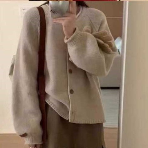 Damen Strickjacke mit asymmetrischem Schnitt und großzügigen Ballonärmeln Drune