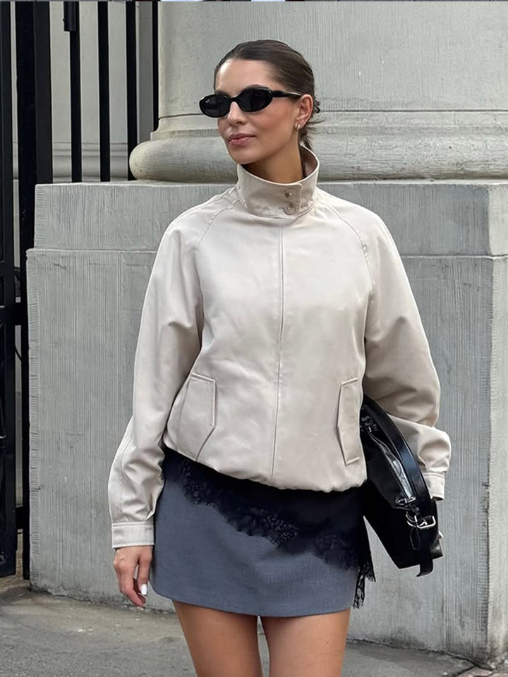 Damen Kunstlederjacke mit hohem Kragen und dekorativen Druckknöpfen Drune