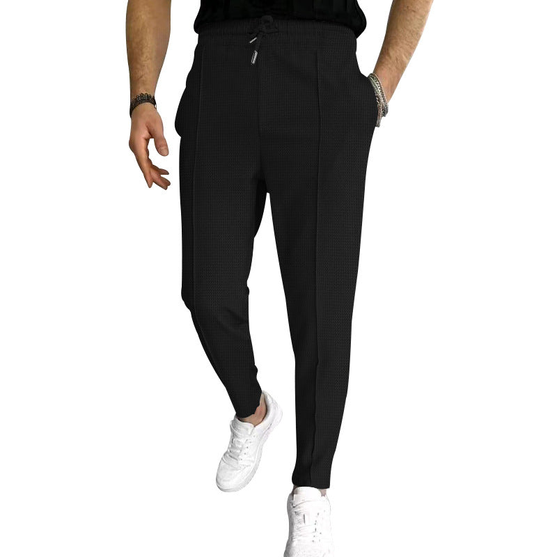 Herren nan schmal zulaufende Jogging-Chino aus strukturierter Webqualität mit elastischem Tunnelzugbund und dekorativer Bügelfalte Drune