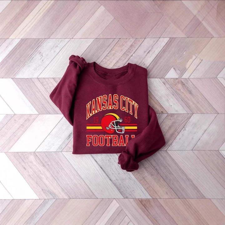 Damen Oversized Sweatshirt mit nostalgischem Football-Motiv Drune