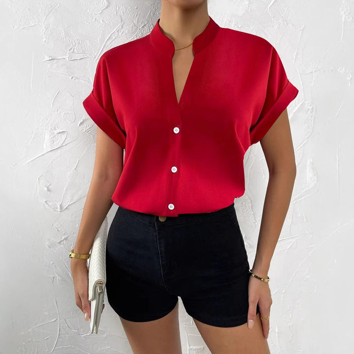 Damen Elegante Kurzarmbluse mit Stehkragen und subtilen Knopfdetails Drune