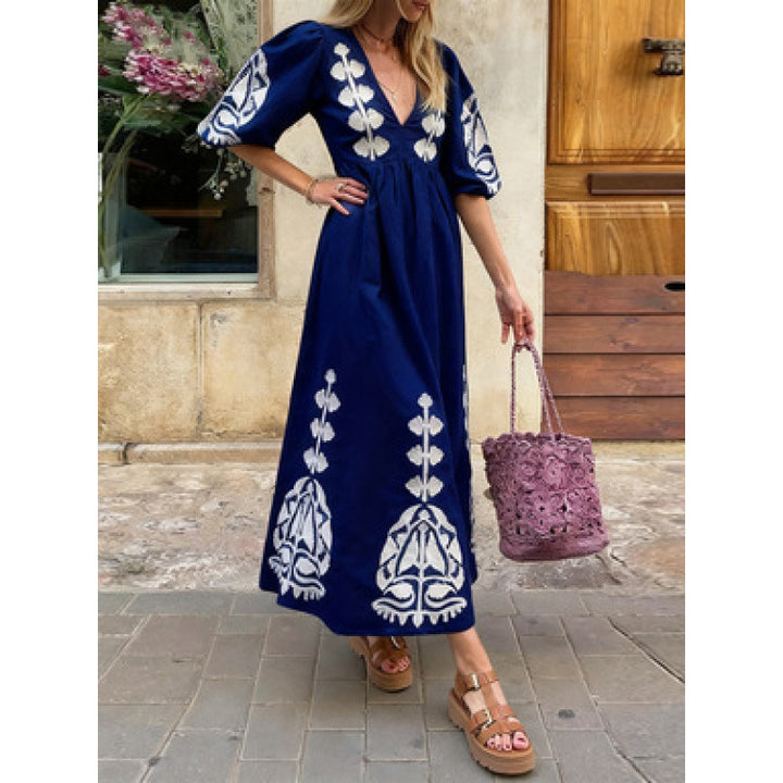 Damen Midikleid mit luftigen Puffärmeln und floralem Stickdesign Drune