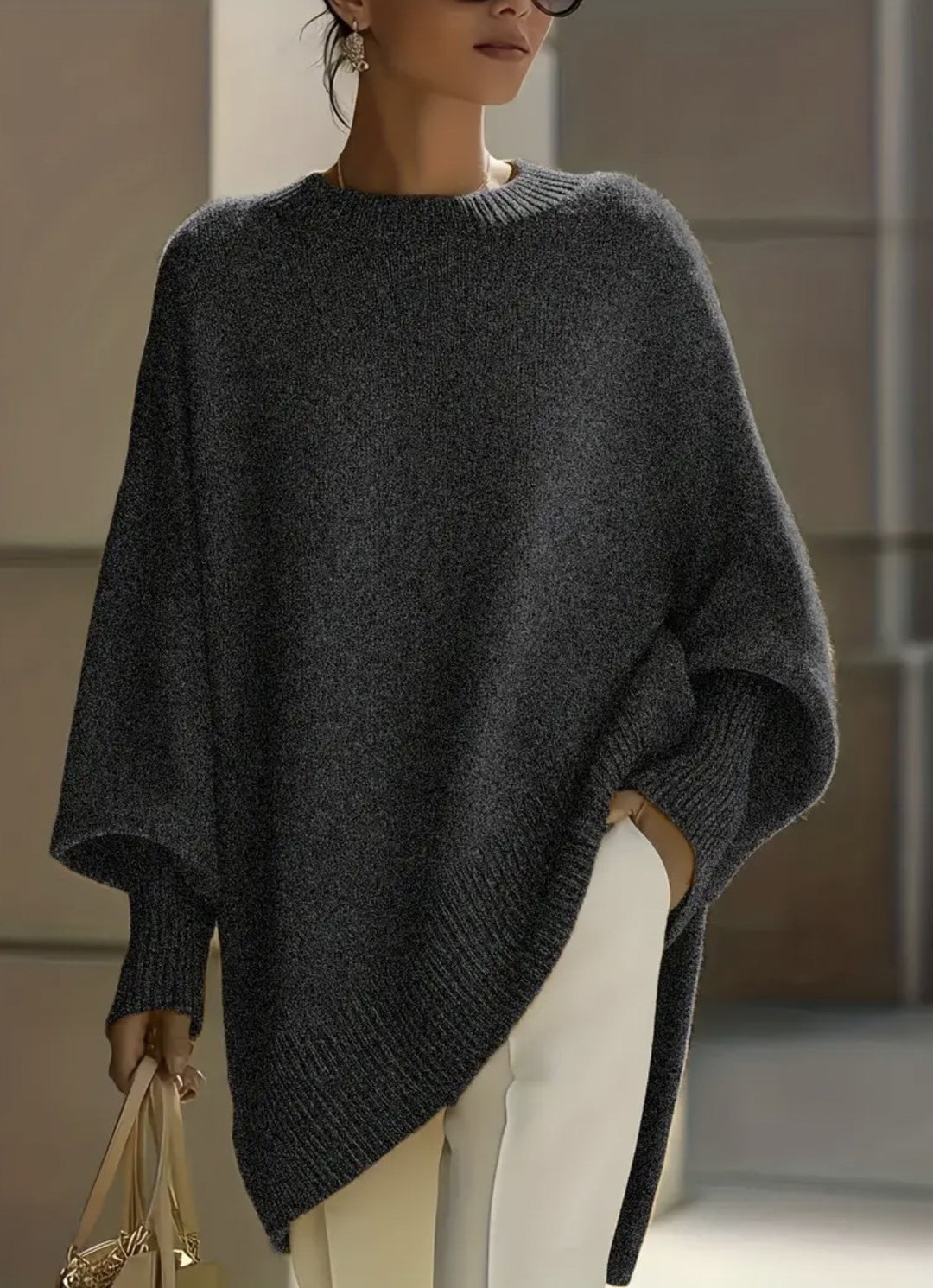 Damen nan Oversize Strickponcho mit asymmetrischem Saum und gerippten Ärmeln Drune