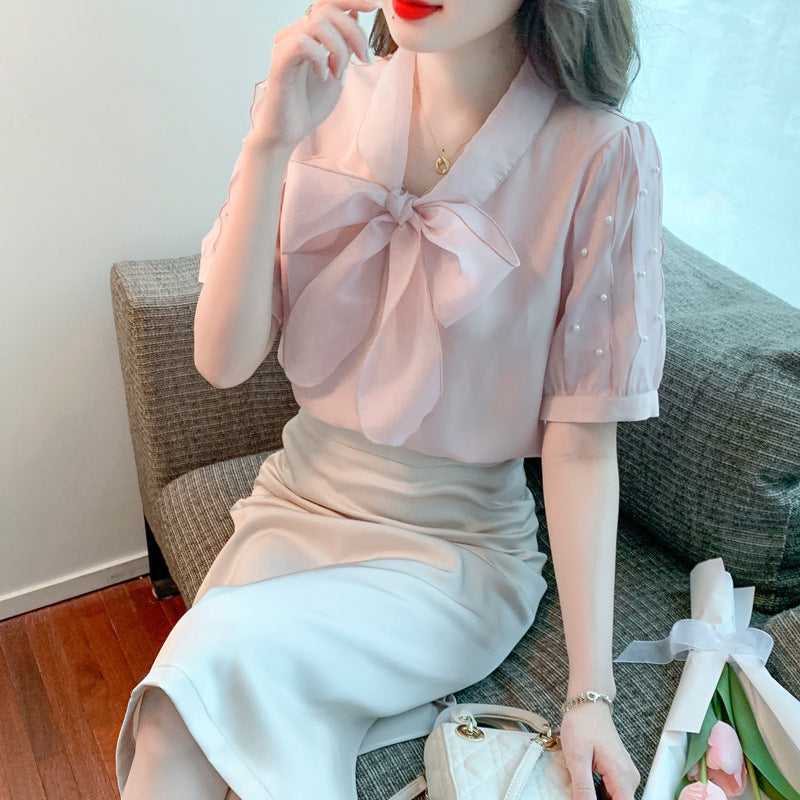 Damen Bluse mit elegantem Schleifen-Ausschnitt und strukturierten Ärmeln Drune