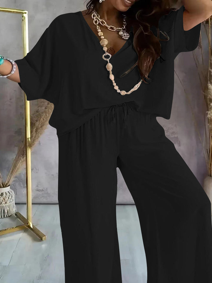 Damen eleganter Jumpsuit mit V-Ausschnitt und weitem Bein Drune