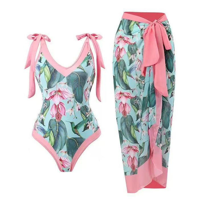 Damen Badeanzug mit floralem Design und transparentem Wickelrock Drune