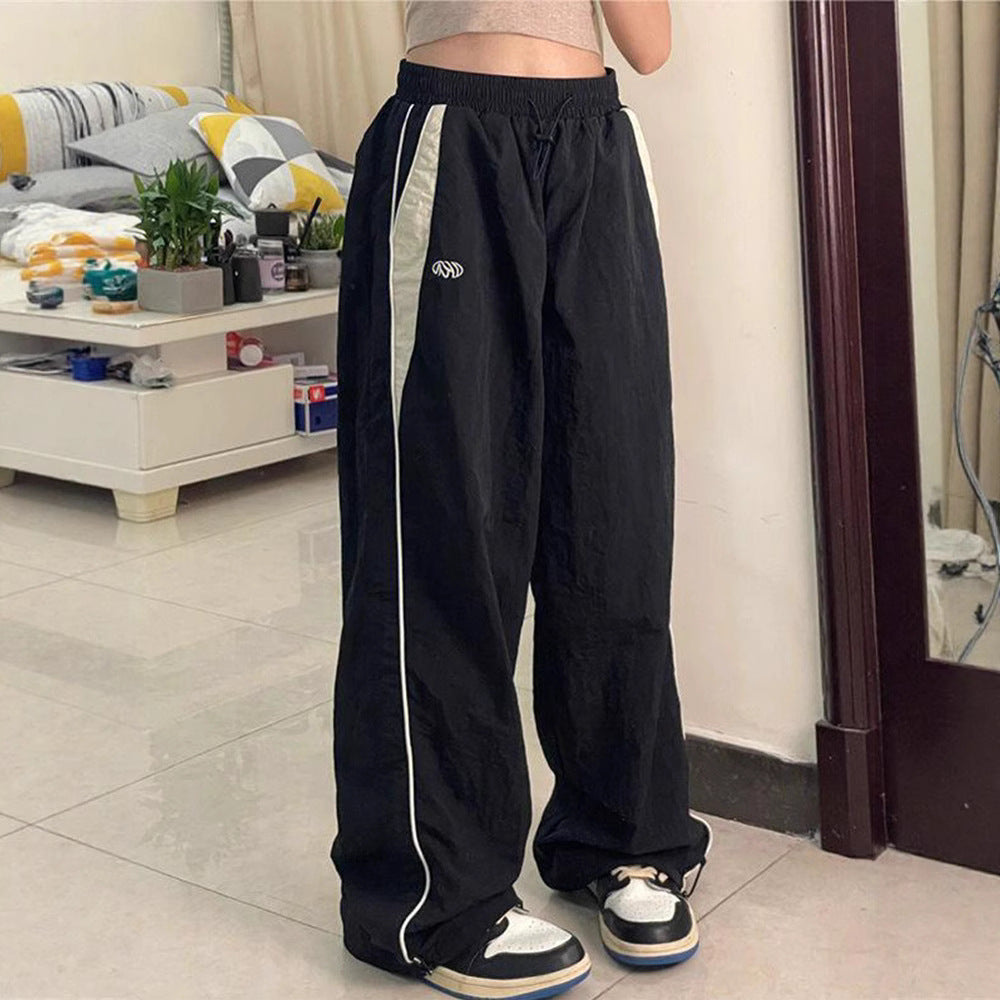 Damen nan weite Trackhose mit Kontrastpaspel, elastischem Bund und Oversize-Schnitt Drune