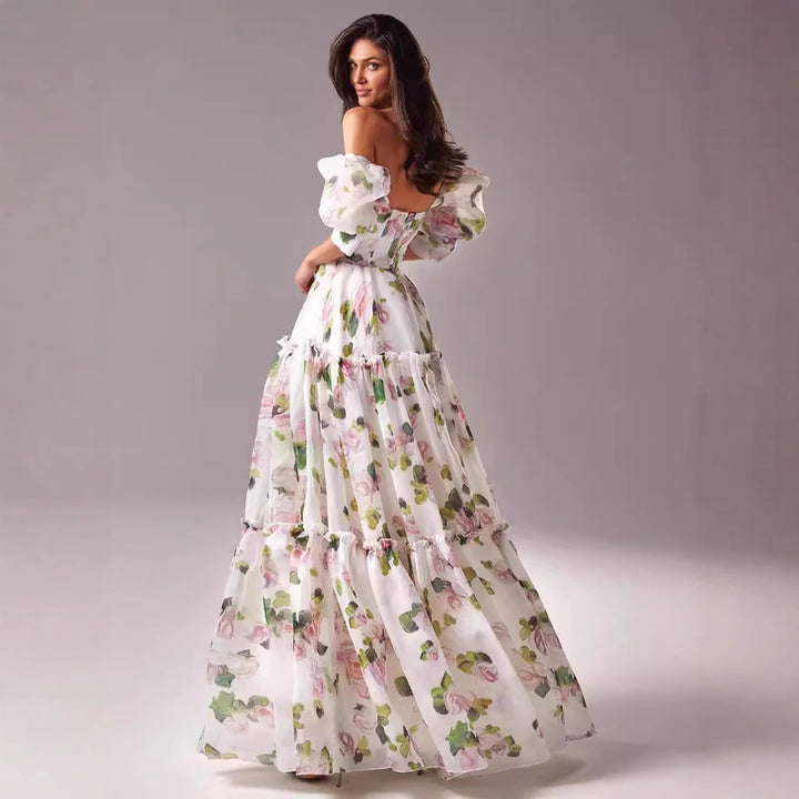 Damen Elegantes Maxikleid mit schulterfreien Rüschenärmeln und floralen Akzenten Drune