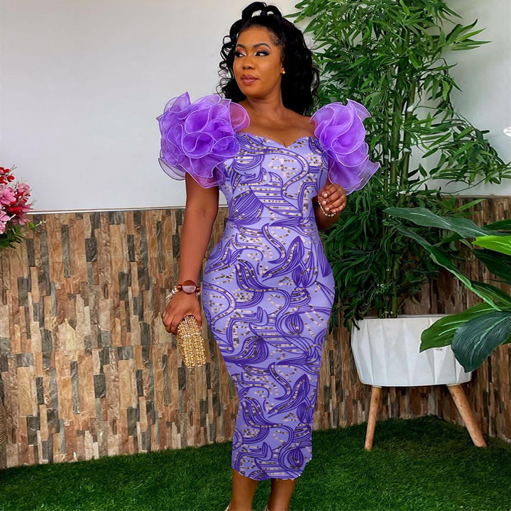 Damen Elegantes Midi-Kleid mit innovativen Puffärmeln und kunstvollem Druck Drune