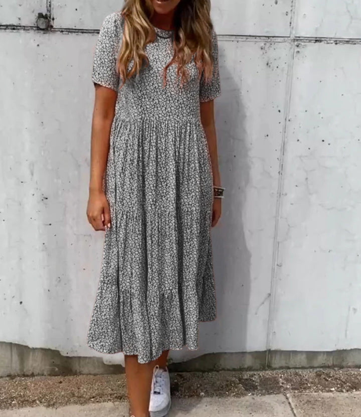 Damen nan geblümtes gekrepptes Midikleid mit geraffter Empire-Taille, kurzen Ärmeln und stufigem Volantrock Drune