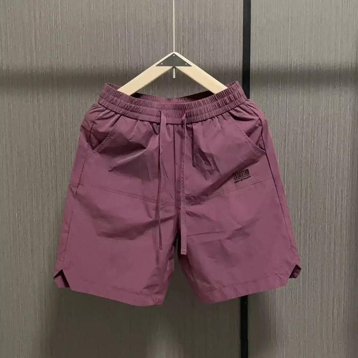 Herren lässige Sportshorts mit elastischem Bund und seitlichen Eingrifftaschen Drune