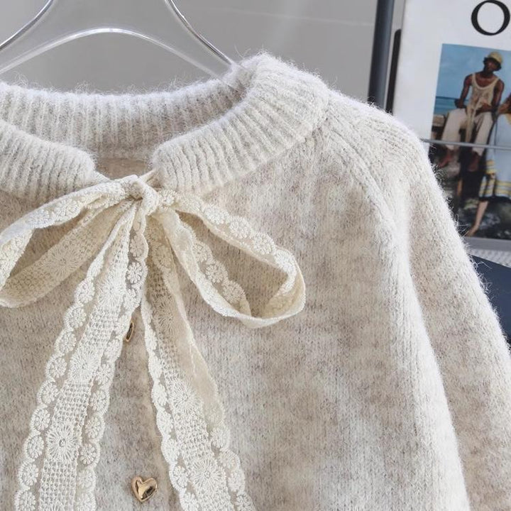 Damen kuschelige Strickjacke mit Herzknopf-Details und Schleifenakzent Drune