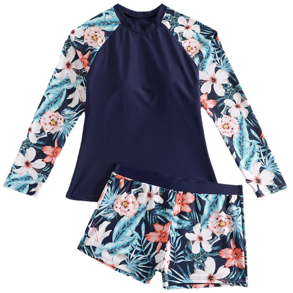 Drune | Damen UV-Schutz Surfanzug mit floralem Design und kontrastierenden Ärmelakzenten