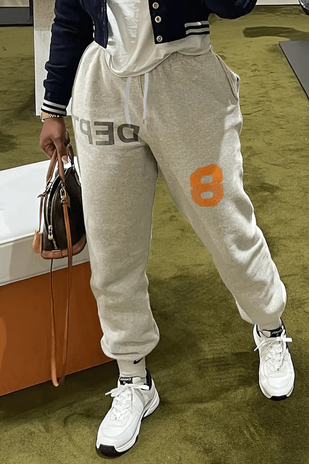 Damen Bequeme Sportpants mit moderner Grafik und elastischem Bund Drune