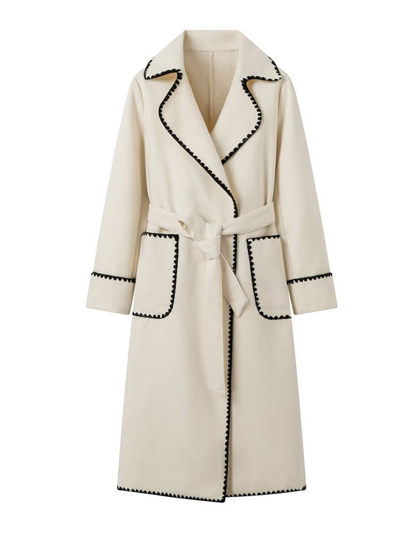 Damen eleganter Longcoat mit Bindegürtel und kontrastierenden Paspeln Drune