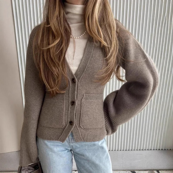 Damen Strickjacke mit voluminösen Ärmeln und praktischen Taschen Drune