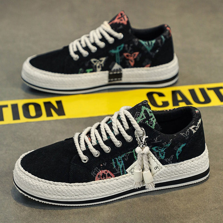 Damen bestickte Canvas‑Sneaker mit Quastenanhänger und geflochtener Plateausohle Drune