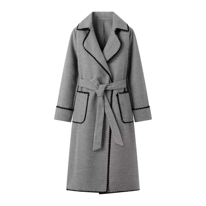Damen eleganter Langmantel mit taillierbarem Gürtel und kontrastierenden Nähten Drune