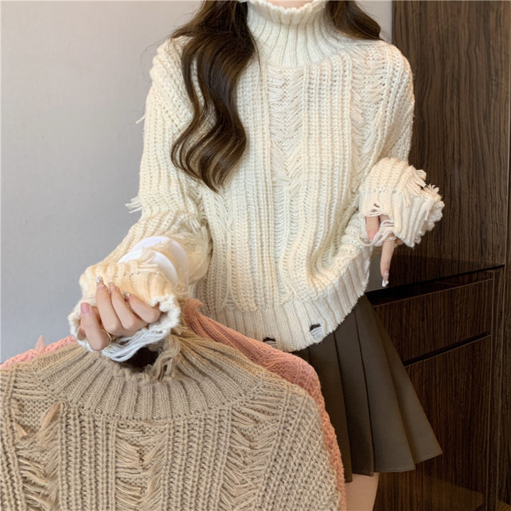 Damen Grobstrickpullover mit hohem Kragen und fransigen Designelementen Drune