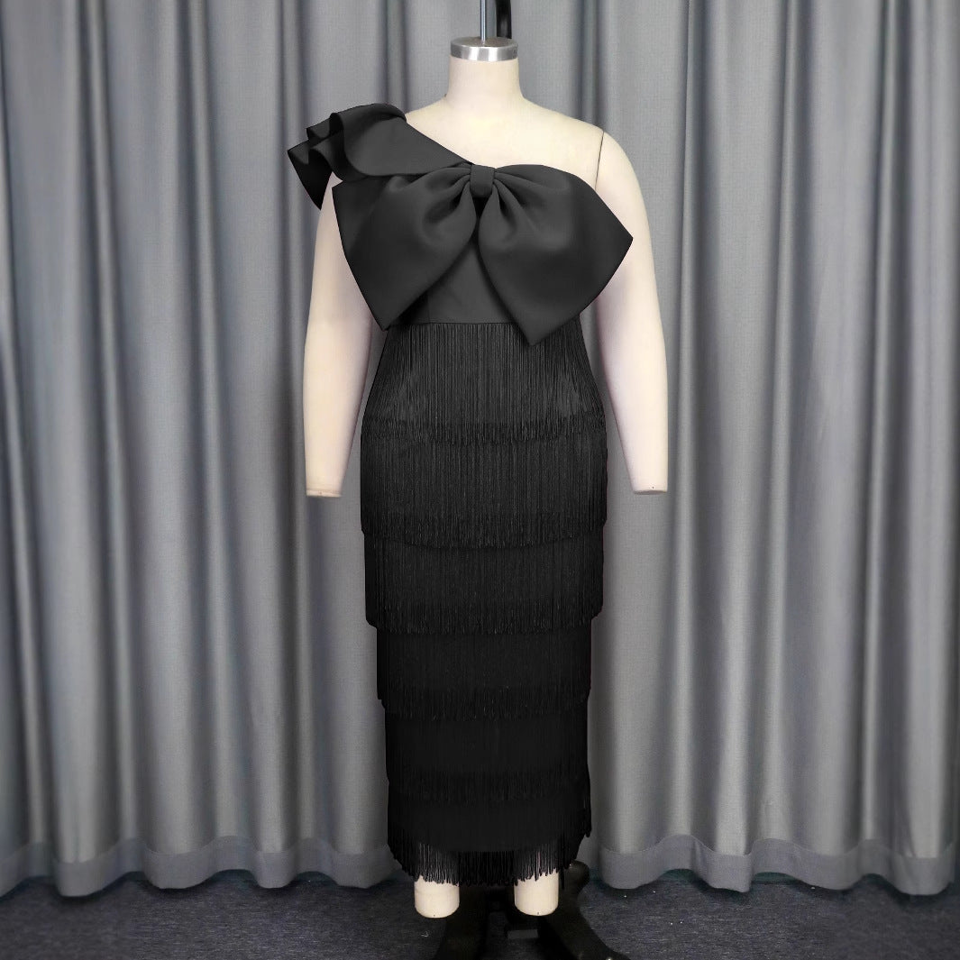 Damen elegantes Kleid mit voluminösem Rüschenelement und Fransen Drune