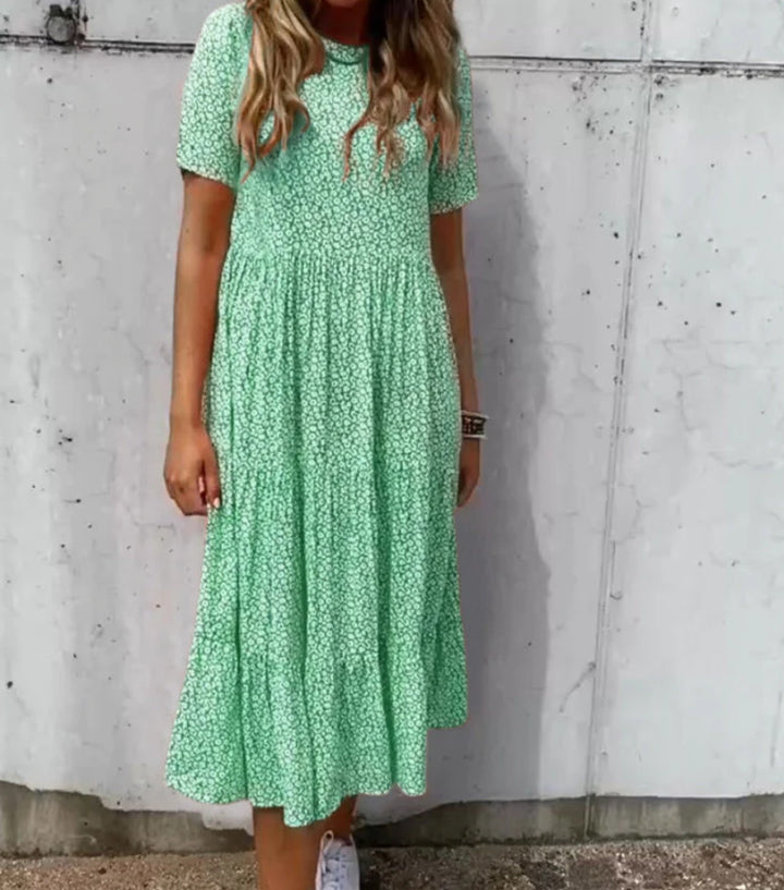Damen nan geblümtes gekrepptes Midikleid mit geraffter Empire-Taille, kurzen Ärmeln und stufigem Volantrock Drune