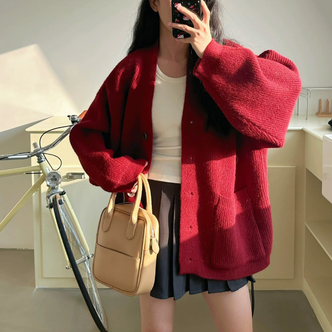 Damen Grobstrickjacke mit eleganten Knopfdetails und praktischen Taschen Drune