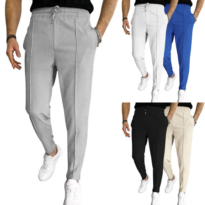 Herren nan schmal zulaufende Jogging-Chino aus strukturierter Webqualität mit elastischem Tunnelzugbund und dekorativer Bügelfalte Drune