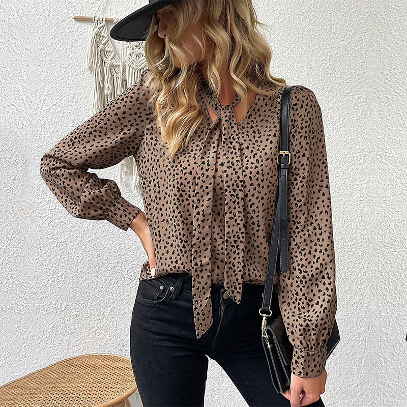Damen Bluse mit dekorativem Tiermuster und verspieltem Bindeband Drune