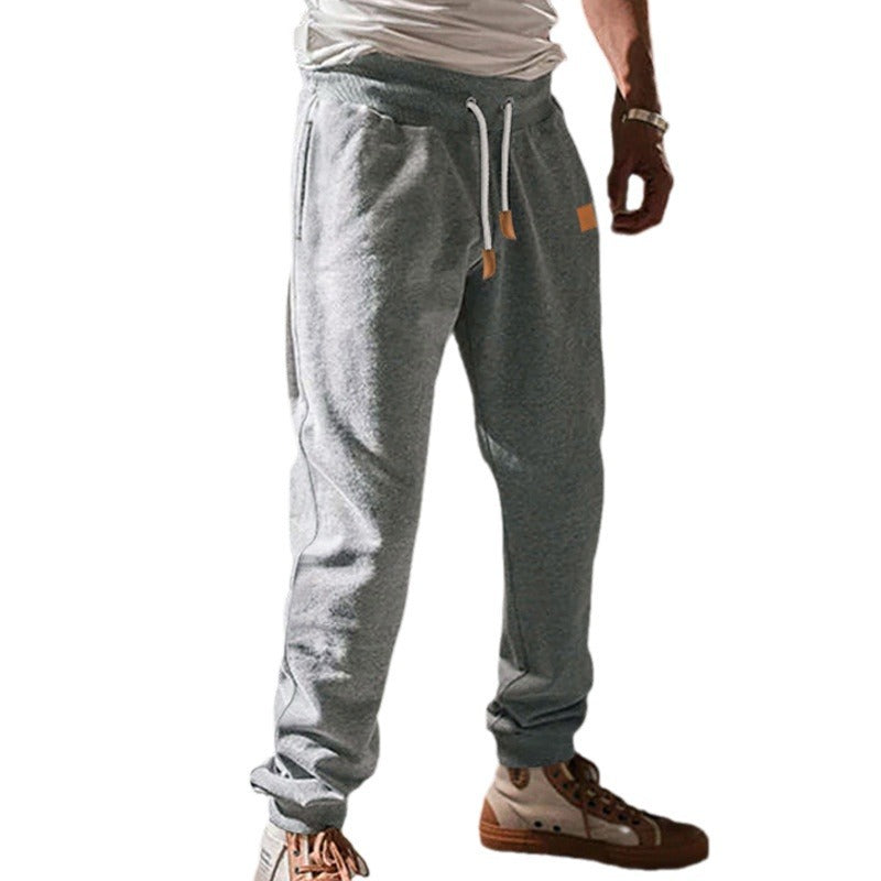 Herren nan konisch geschnittene Freizeithose aus Sweatstoff mit elastischem Bund Kordelzug und Rippbündchen Drune